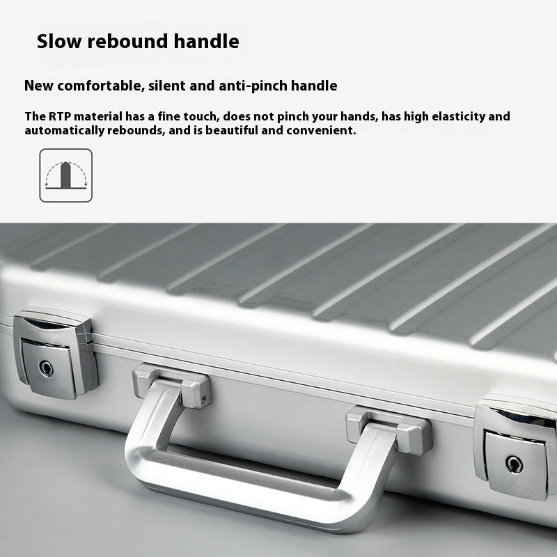 Silver suitcase with a handle on a gray background, featuring text about the handle's features.