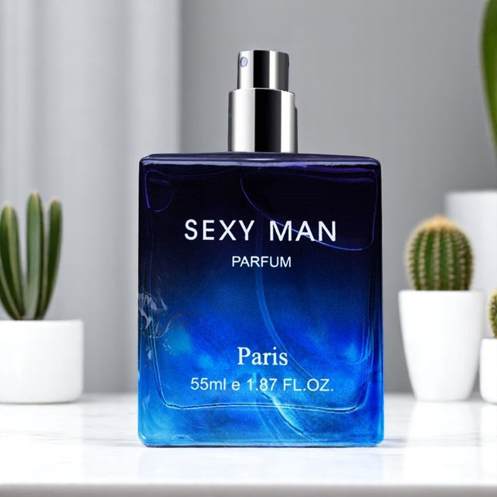 Blue 'SEXY MAN PARFUM' bottle with cacti in the background