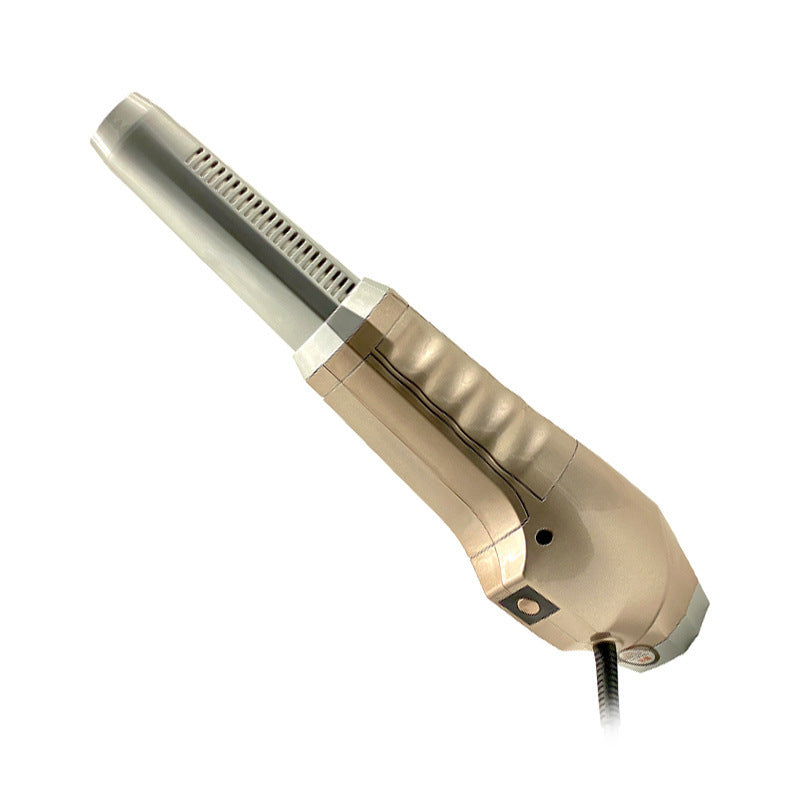 Gold-colored hair dryer on a white background