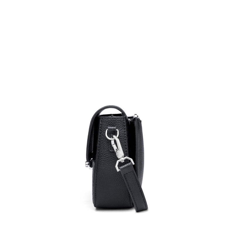 Black handbag with a strap on a white background