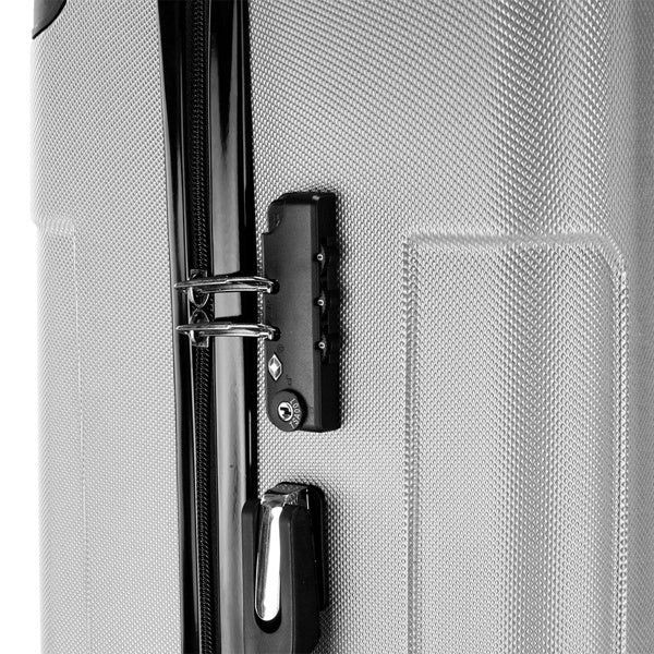 Close-up of a silver suitcase with a handle and lock mechanism.