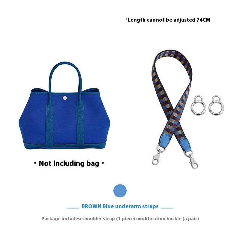Blue bag with a checkered strap and buckles on a white background