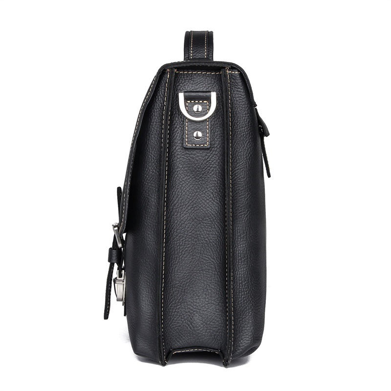 Black leather crossbody bag on a white background