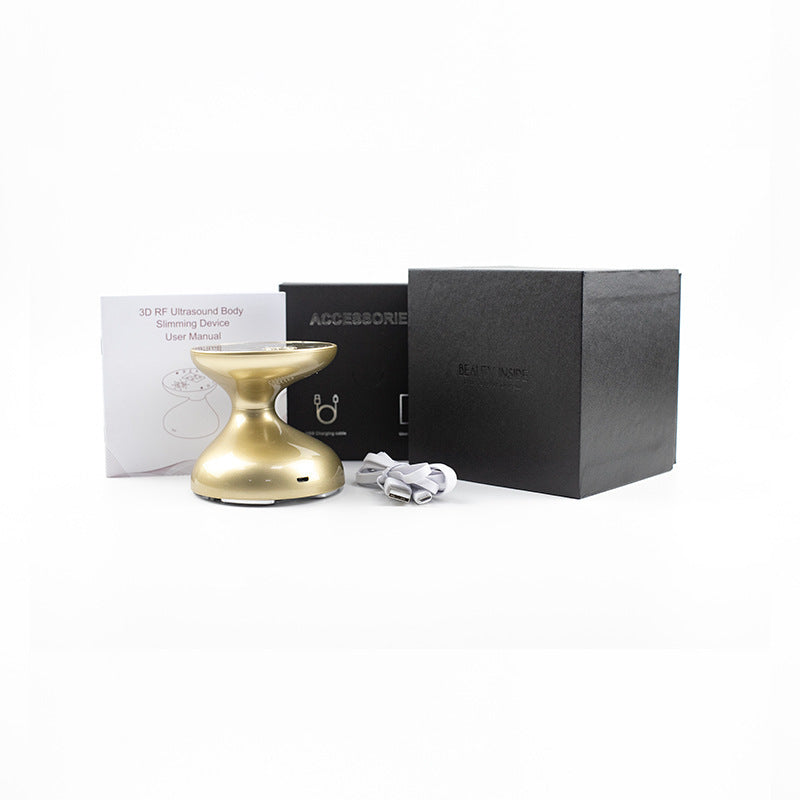 Gold ultrasonic cleaning device with accessories and manual on a white background