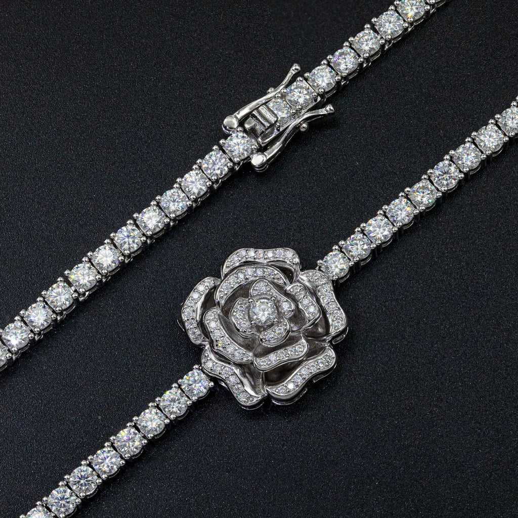 Diamond bracelet with a rose-shaped clasp on a black background
