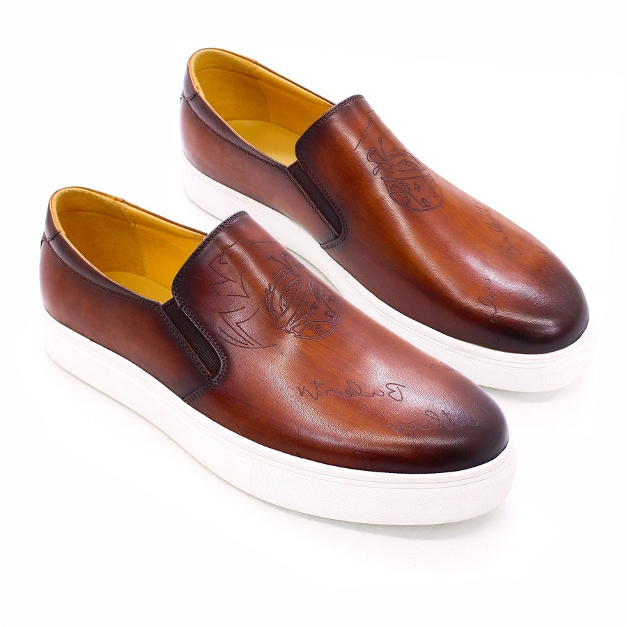 Pair of brown leather shoes with white soles on a white background