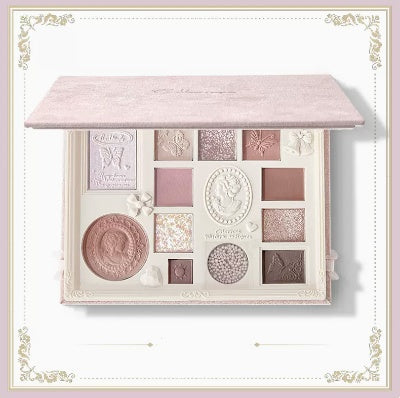 Makeup palette with decorative design on a white background