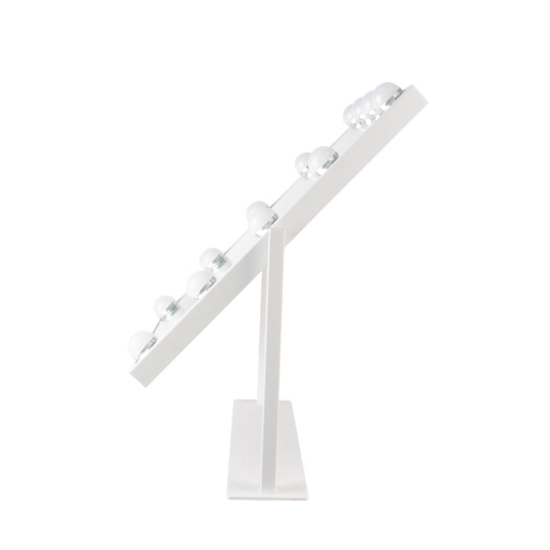 White adjustable stand with multiple light bulbs on a white background