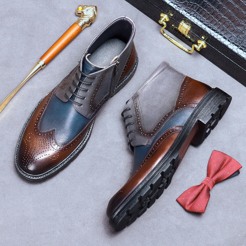 Brown and blue dress shoes with a red bow tie and gold-handled shoe horn on a gray surface.