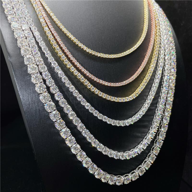 Set of diamond necklaces on a black background