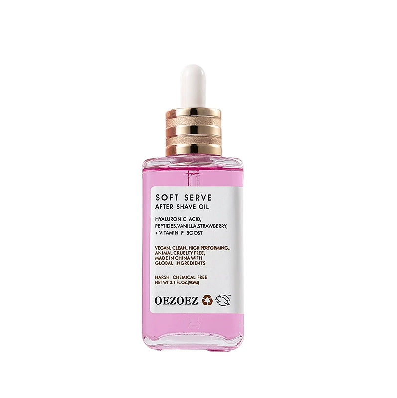 Pink bottle of Oezoe after shave oil with a white cap on a white background