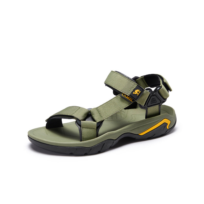 Green sandal with black and orange accents on a white background