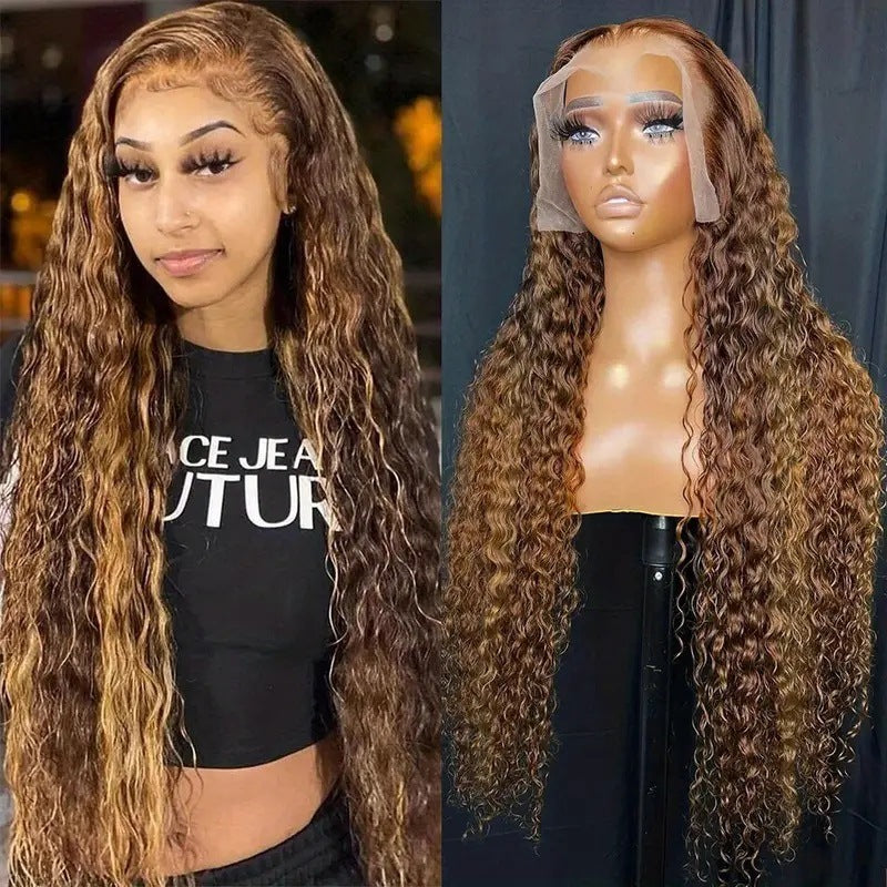 Person with long wavy hair and a mannequin head with a wig on a dark background