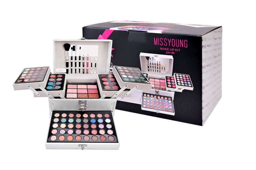 Makeup set with various palettes and tools, displayed in front of a MissYoung branded box.