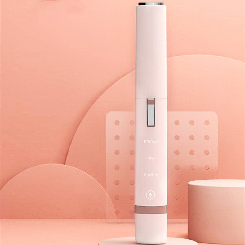 White electronic device with display on a pink background