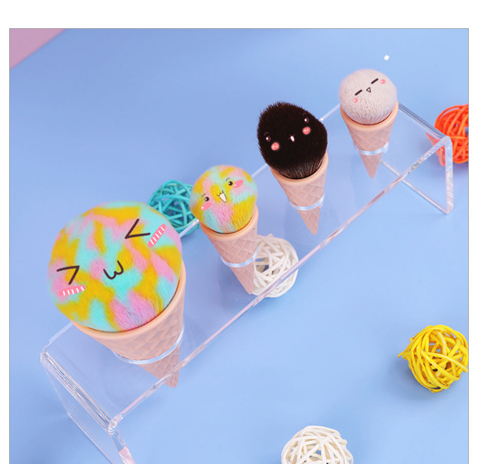 Colorful makeup items on a clear stand with a blue background
