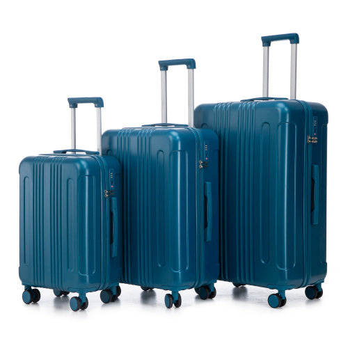 Set of blue suitcases of different sizes on a white background