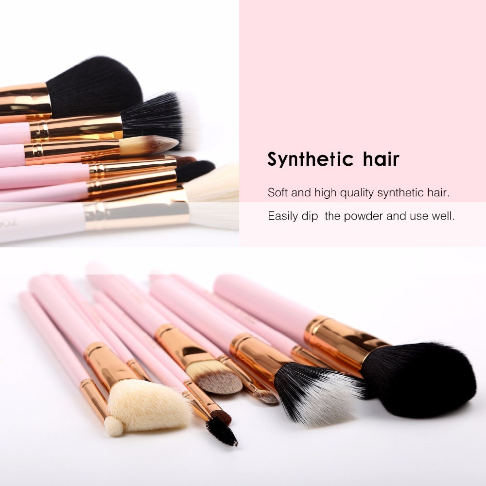 Makeup brushes with synthetic hair on a white background