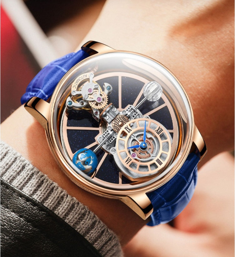 Luxury watch with blue strap on a person's wrist
