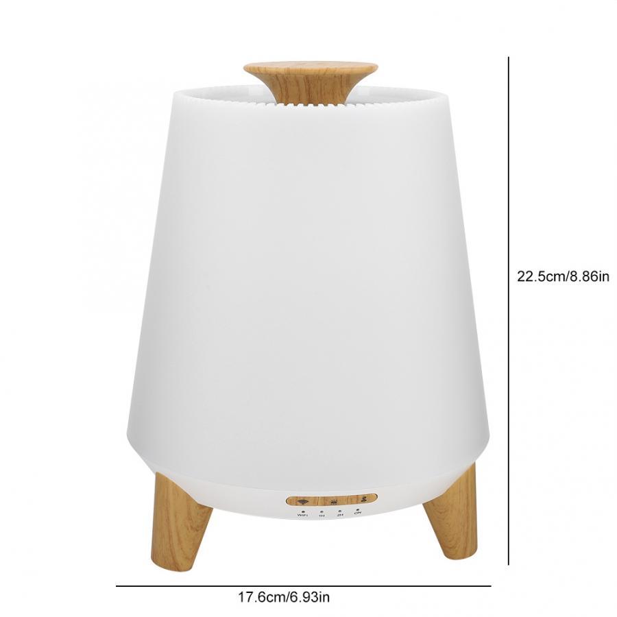 White lamp with wooden base and top on a white background