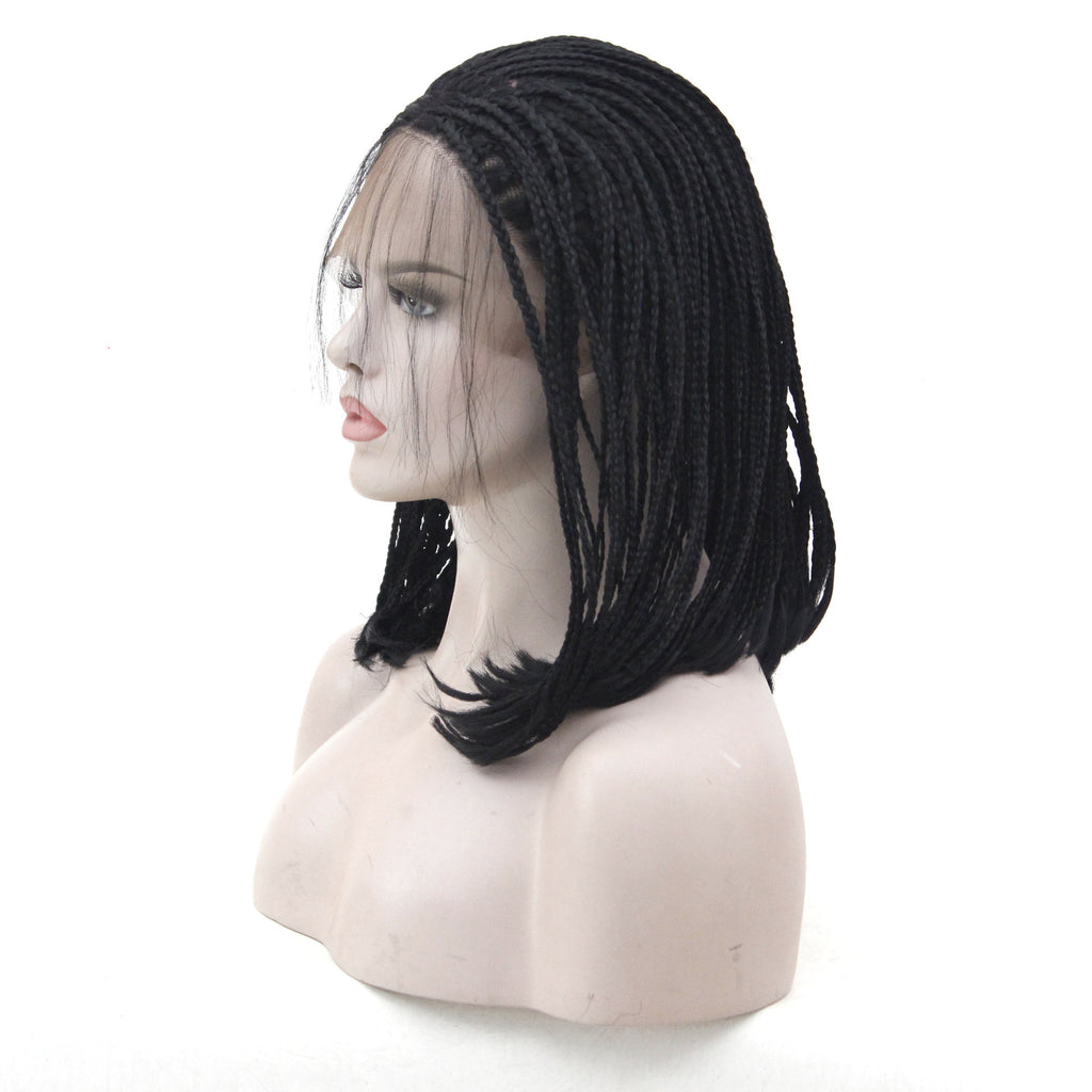 Black braided wig on a mannequin head against a white background