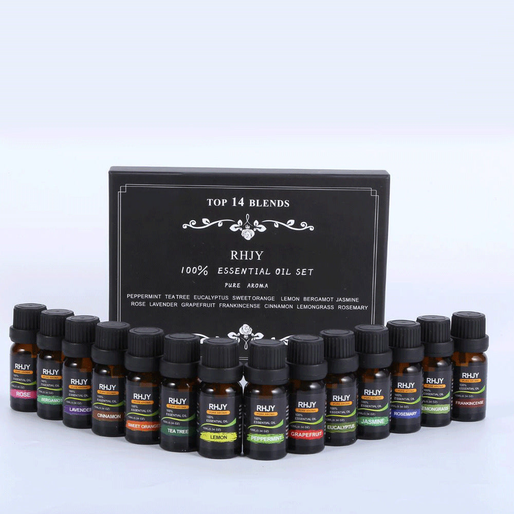Set of essential oil bottles with a black box labeled 'Top 14 Blends' on a white background