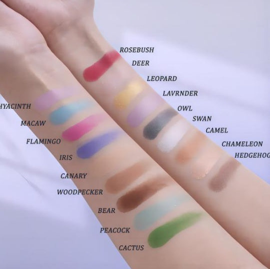 Color swatches on a person's arm with labeled names against a white background