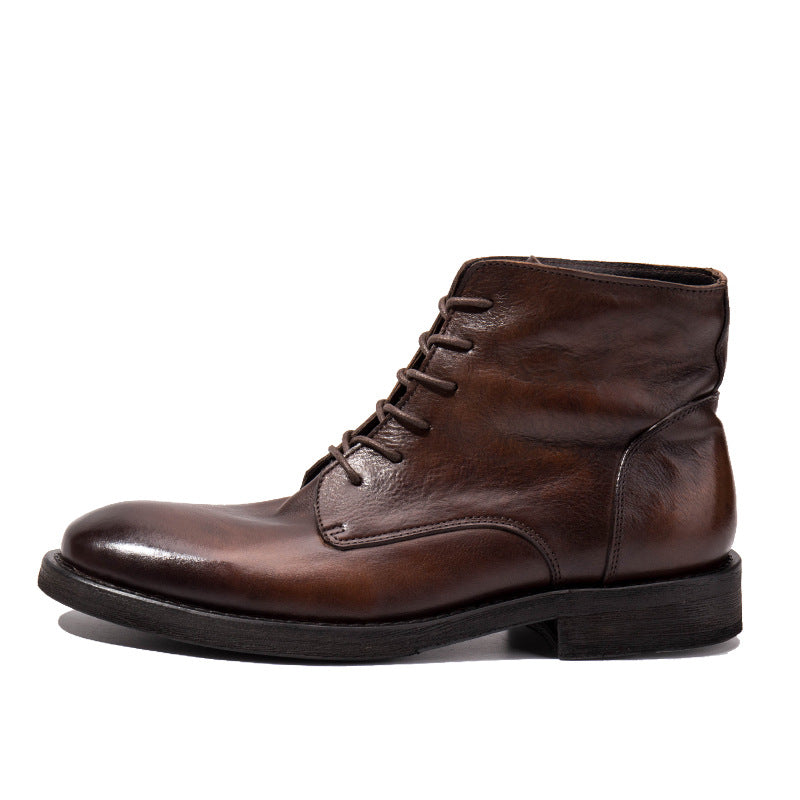 Brown leather boot on a white background