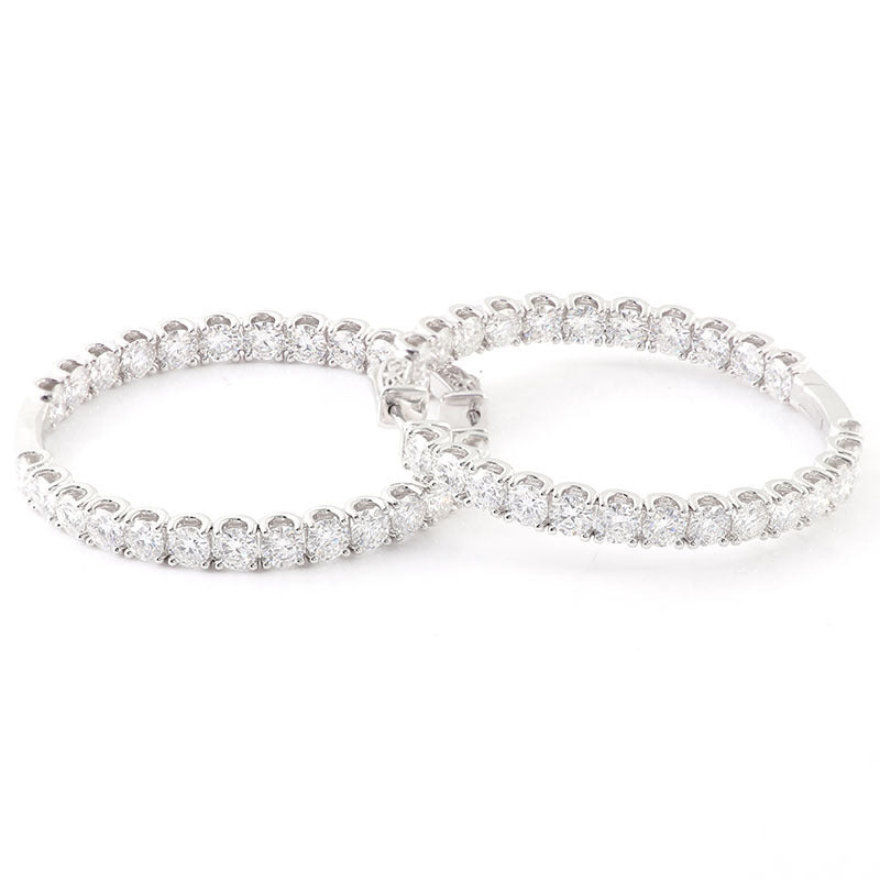 Two diamond eternity bands on a white background