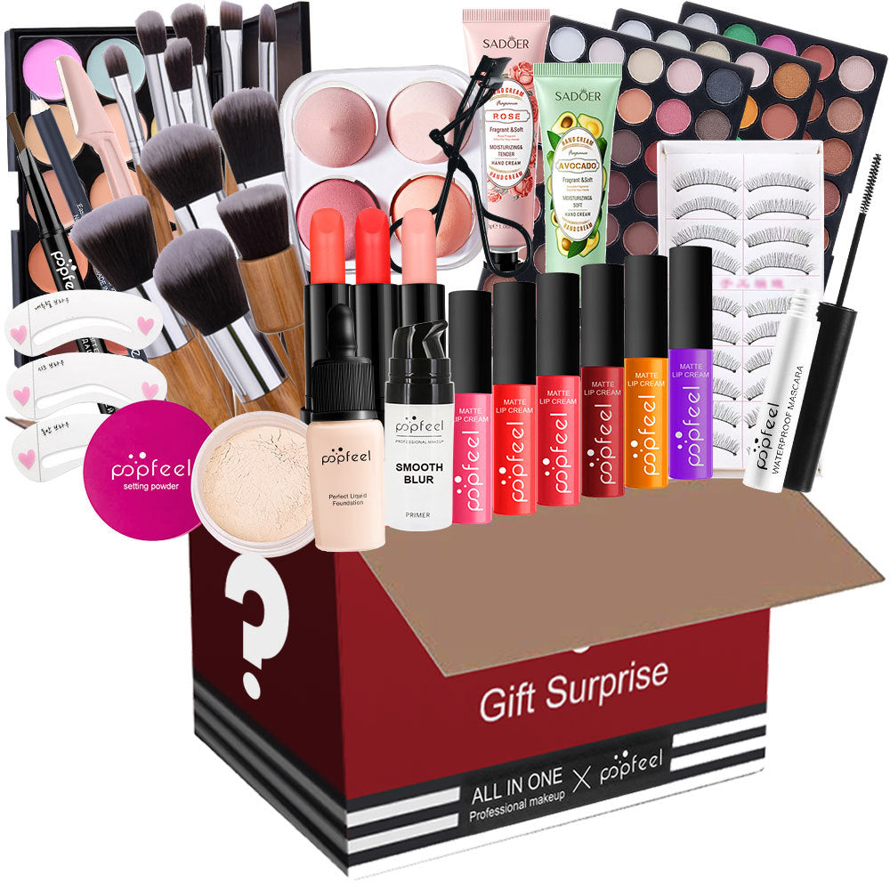 Makeup gift set with various products including brushes, lipsticks, and eye shadows in a box labeled 'Gift Surprise'.
