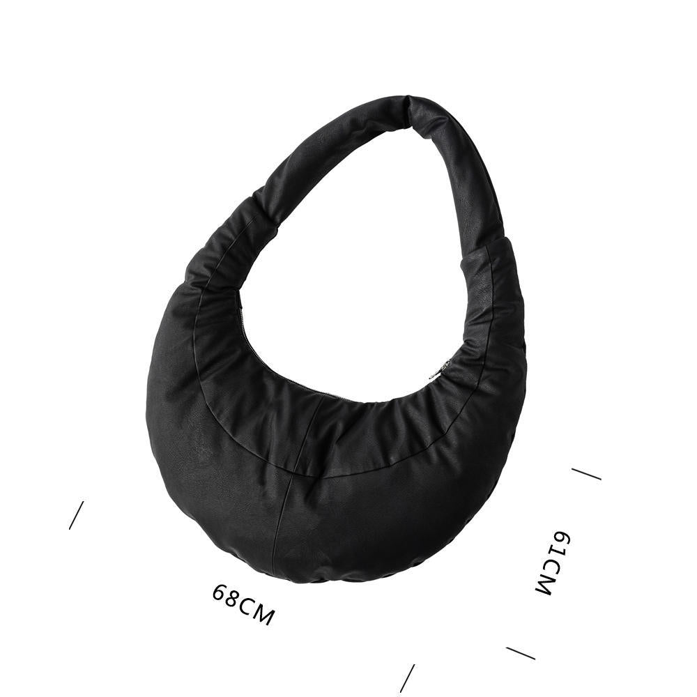Black shoulder bag with measurements on a white background