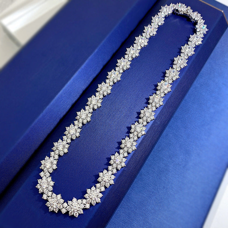 Diamond necklace on a blue jewelry box