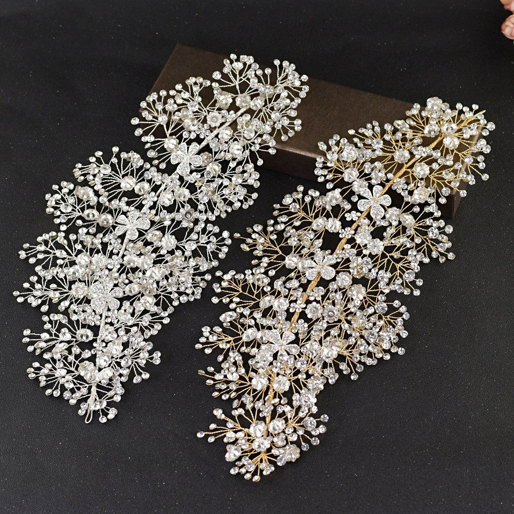 Decorative headband with pearls and crystals on a black background
