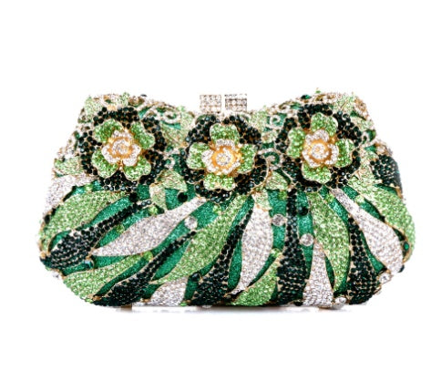 Floral embellished clutch bag with green and black design on a white background