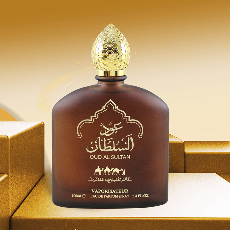 Oud Al Sultan perfume bottle with gold cap on a matching background