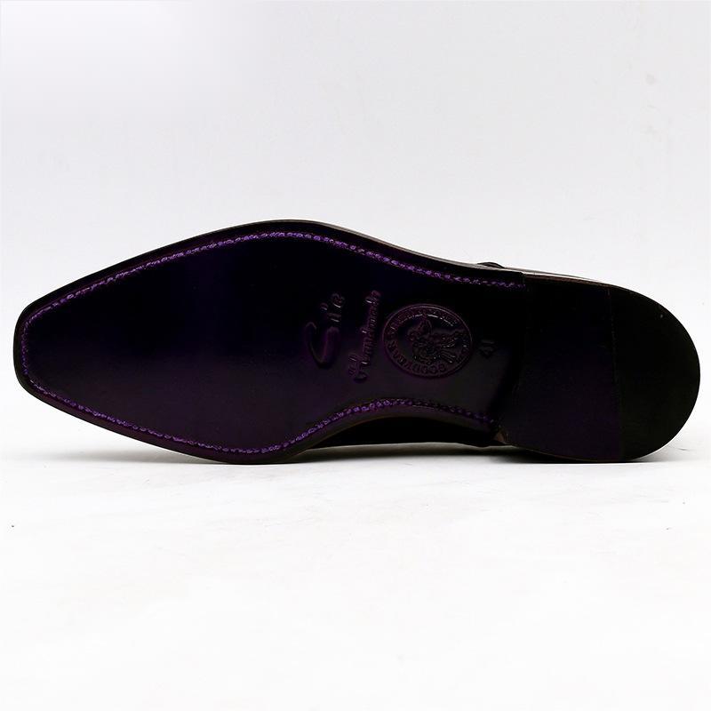 Black leather shoe with purple stitching on a white background