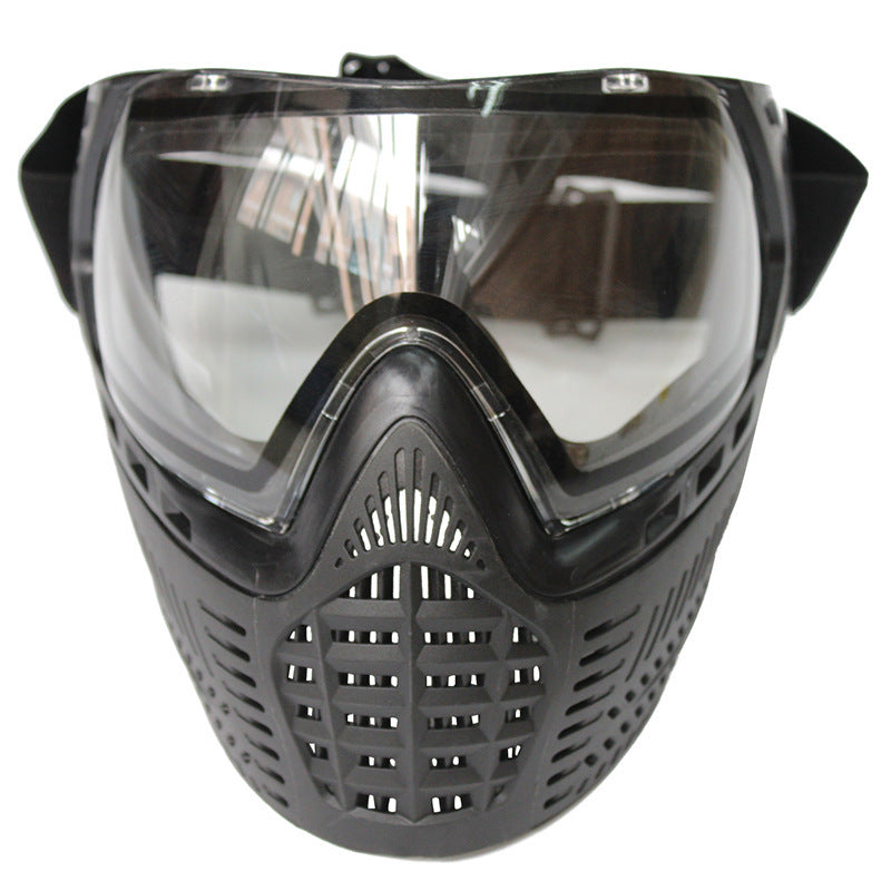 Black tactical mask with clear visor on a white background
