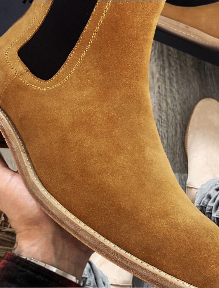 Close-up of a brown suede shoe with a blurred background