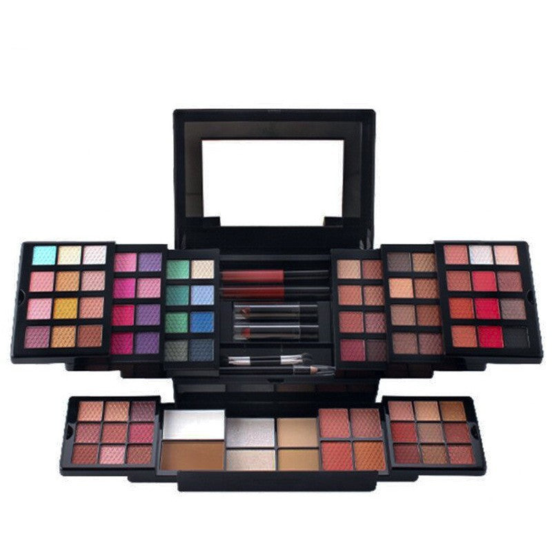 Makeup palette with various colors on a white background