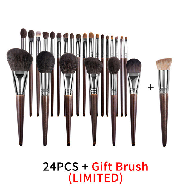 Set of 24 makeup brushes with a gift brush on a white background