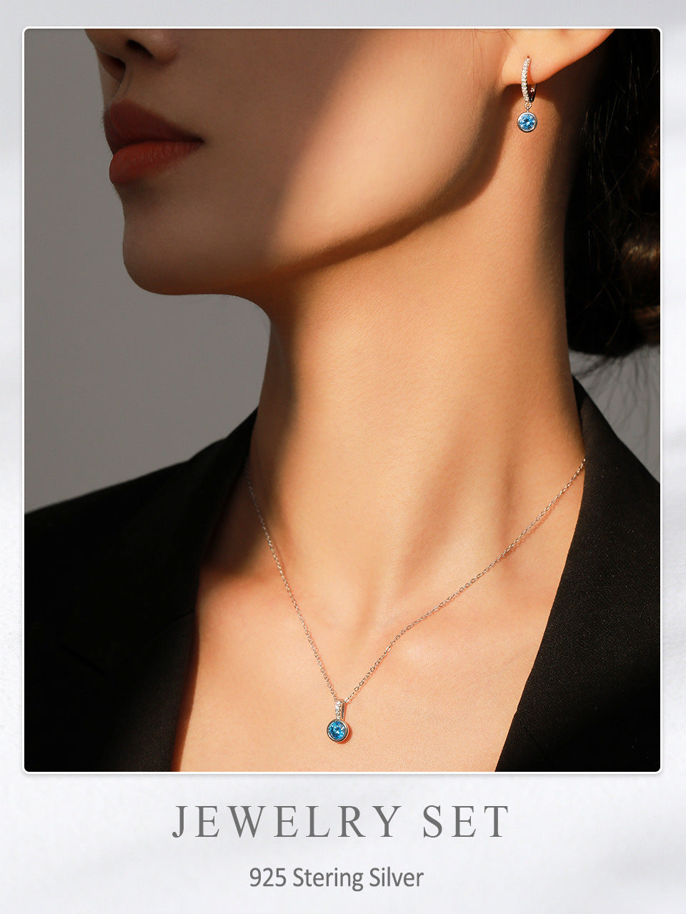 Jewelry set with necklace and earrings on a model, featuring 925 Sterling Silver text.