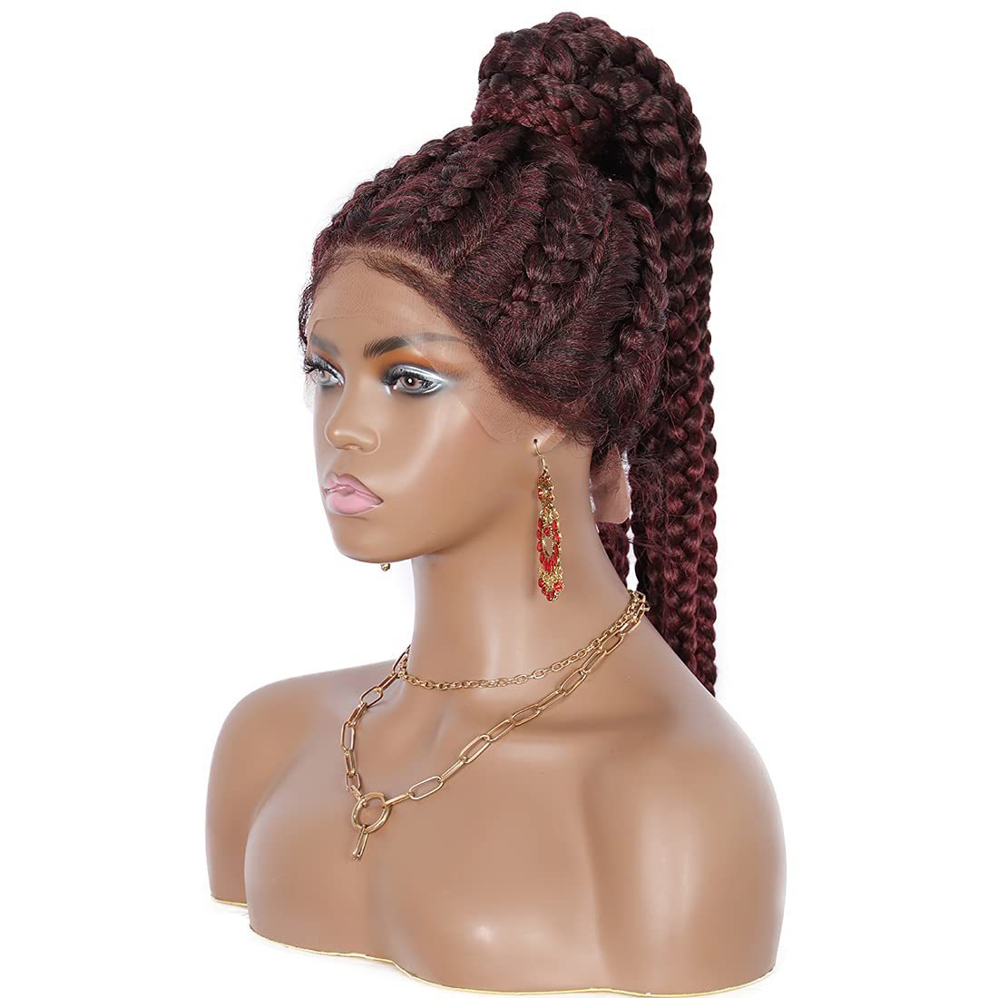 Mannequin head with braided hair styled in a high bun on a white background