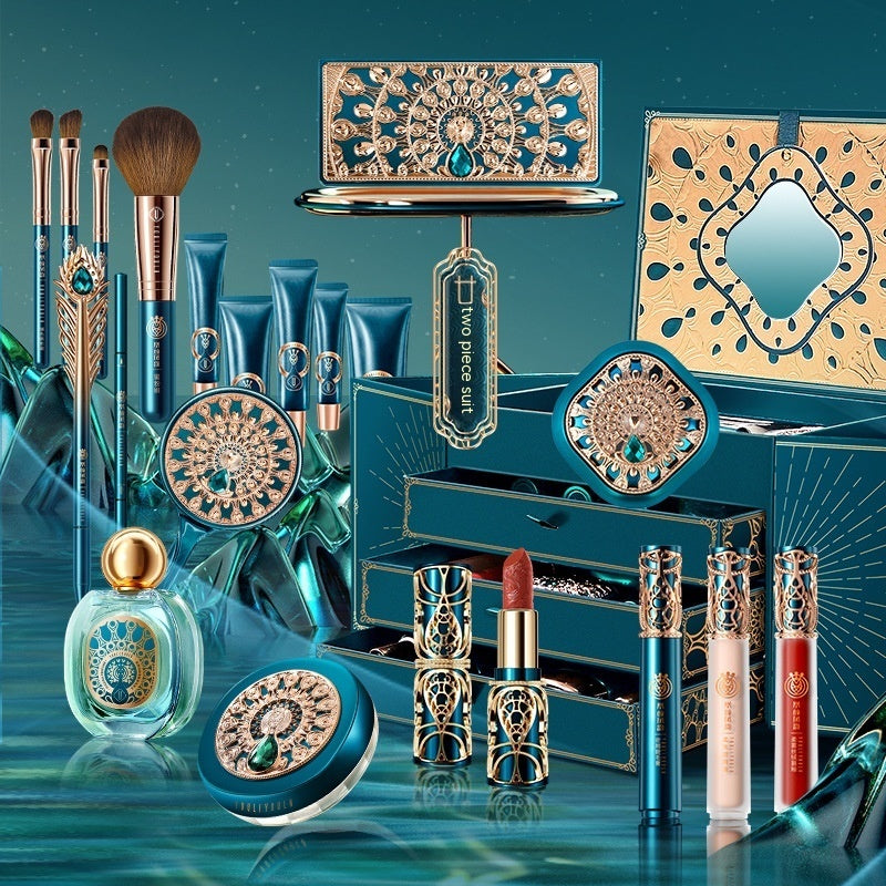 Luxury makeup set with decorative items on a reflective surface