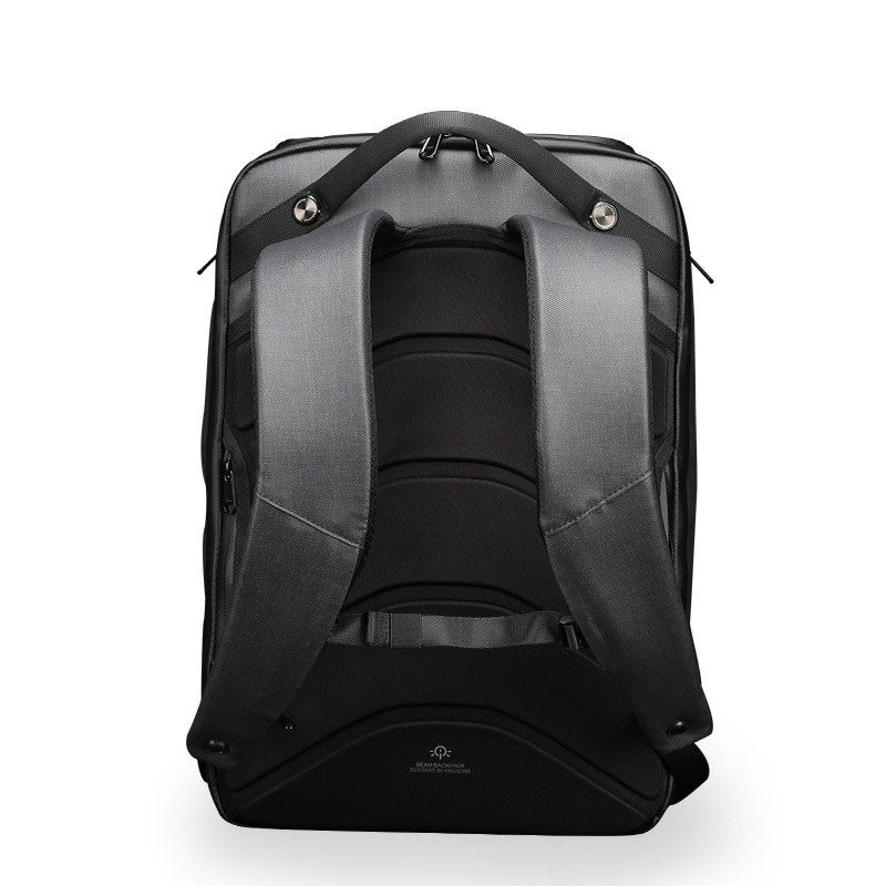 Black backpack with visible brand logo on a white background