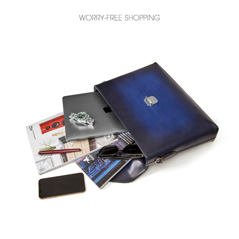 Blue leather clutch bag with various items on a white background