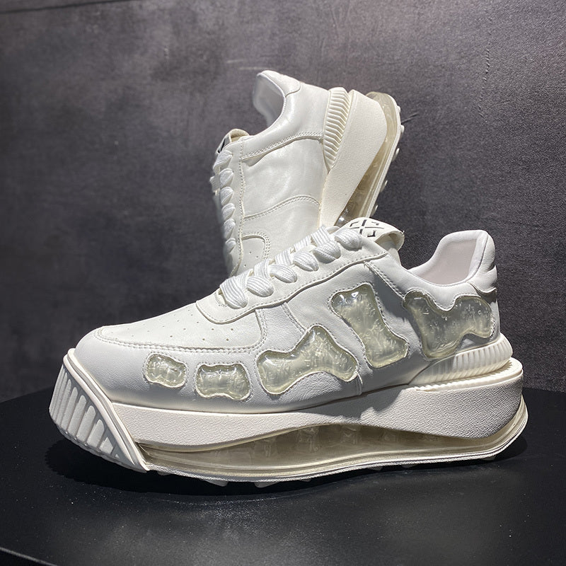 White sneakers with transparent panels on a dark background