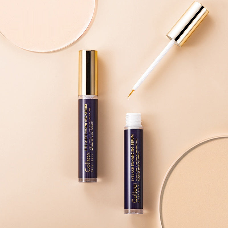 Two bottles of Colorescience Eyelash Enhancing Serum on a beige background
