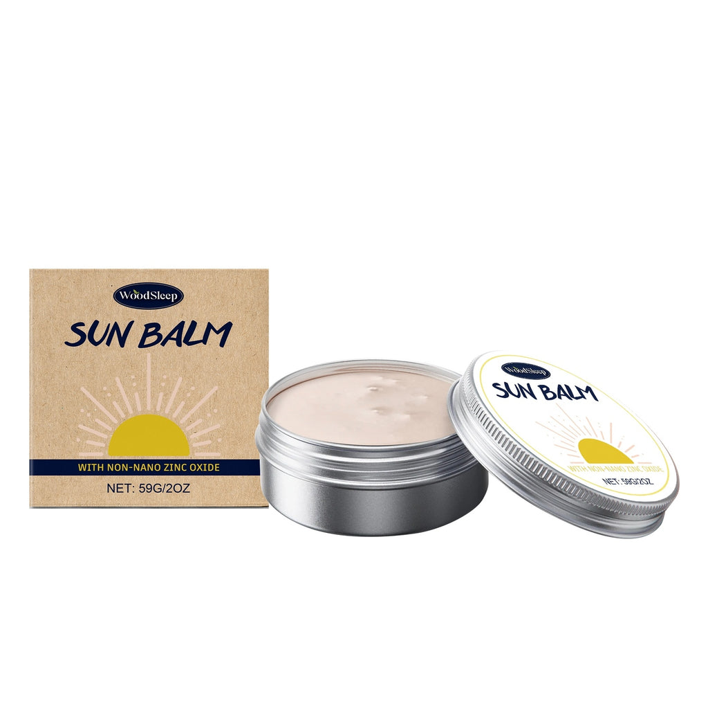 Sun balm with open container and packaging on a white background