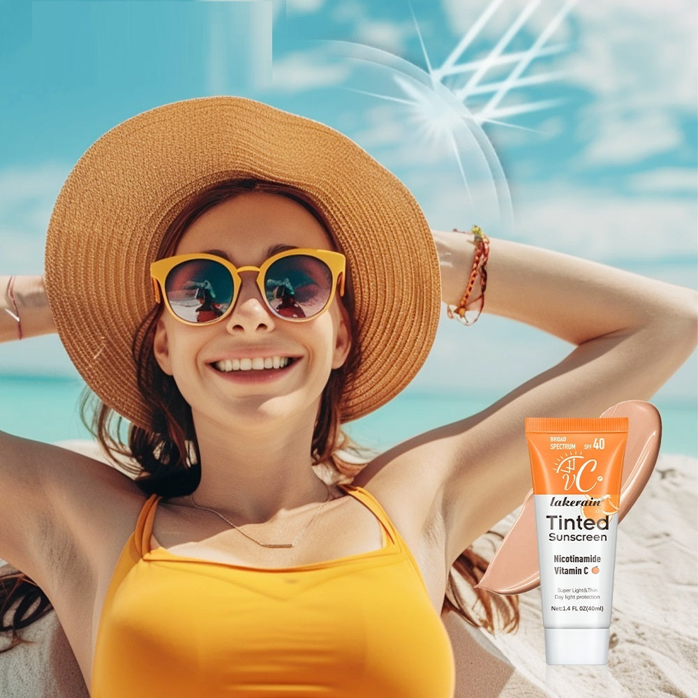 Woman in sun hat and sunglasses with Lacoste Tinted Sunscreen on a beach