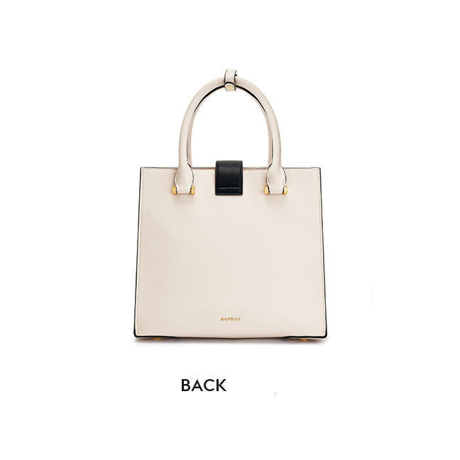 Beige handbag with black accent on a white background